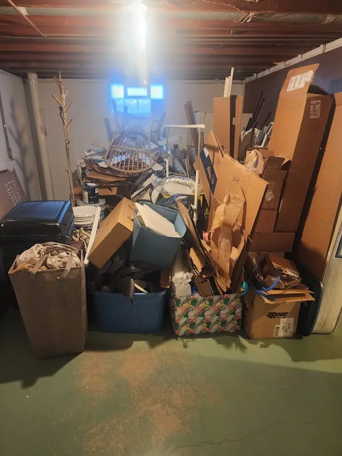 Roll-off dumpster container at job site for Construction Dumpster Rental in Chelsea